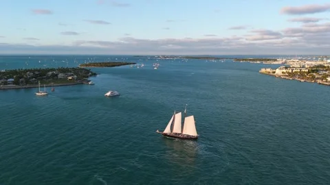 Panoramic view of serene and expansive body of water adorned with various boats Stock Footage 266945938