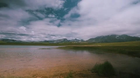 Panoramic View of Serene Lake in UHD 4K | Tranquil Nature Landscape 스톡 동영상 310695893