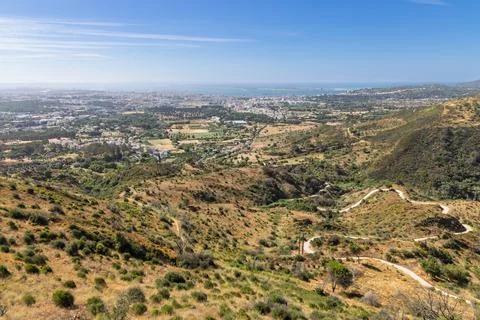 Panoramic view from the Serra da Arrbida hills, showing a winding road leadin Stock Photos