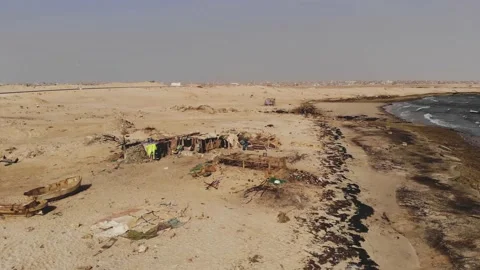 Panoramic view of a settlement in Mauritania. settlement in Mauritania. Settl Stock Footage 137089382