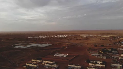 Panoramic view of a settlement in Mauritania. settlement in Mauritania. Settl Stock Footage 137089514