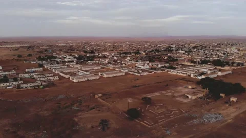 Panoramic view of a settlement in Mauritania. settlement in Mauritania. Settl Stock Footage 137089701