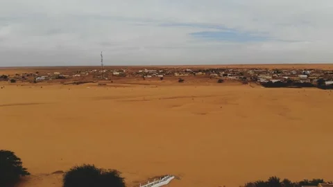 Panoramic view of a settlement in Mauritania. settlement in Mauritania. Settl Stock Footage 137492678