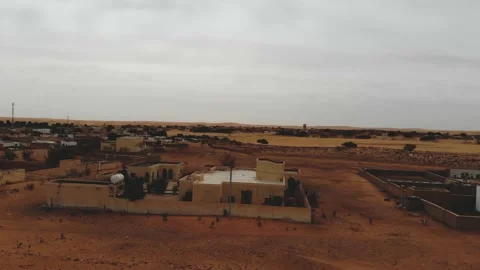 Panoramic view of a settlement in Mauritania. settlement in Mauritania. Settl Stock Footage 137492745