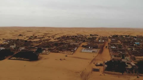 Panoramic view of a settlement in Mauritania. settlement in Mauritania. Settl Stock Footage 137492910