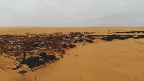 Panoramic view of a settlement in Mauritania. settlement in Mauritania. Settl Stock Footage 137492948