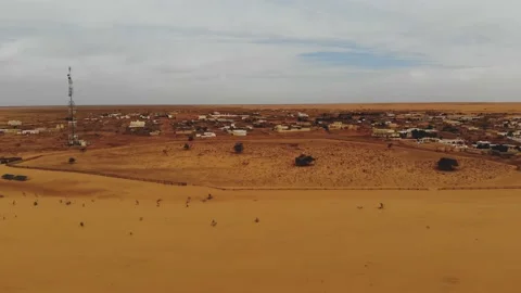 Panoramic view of a settlement in Mauritania. settlement in Mauritania. Settl Stock Footage 137493019