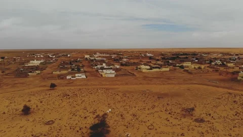 Panoramic view of a settlement in Mauritania. settlement in Mauritania. Settl Stock Footage 137493319