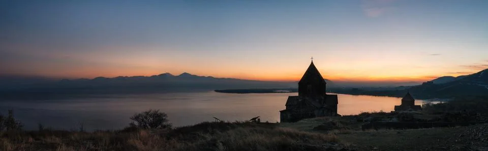 Panoramic view of Sevan Lake at sunset, Armenia Stock Photos
