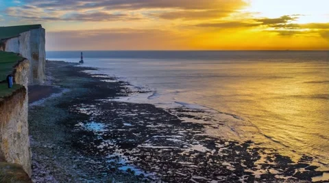 Panoramic view of Seven Sisters cliffs with lighthouse and sea Stock-Footage 59954453