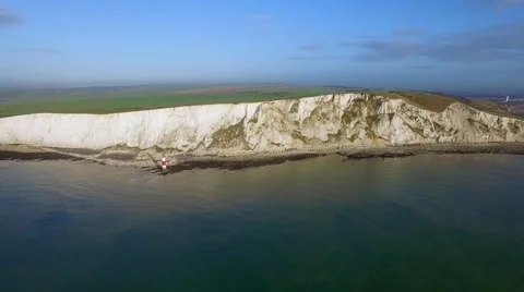 Panoramic view of Seven Sisters cliffs with lighthouse and sea Stock Footage 59954536