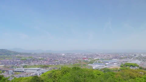 Panoramic view of Shin-Tosu Station and Tosu City from Asahiyama Park, Saga Vídeos de archivo 333205199