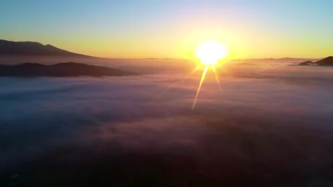 A Panoramic View of Shiodan Plain, Sea of Clouds, and Sunrise from Above Stock Footage 333196425