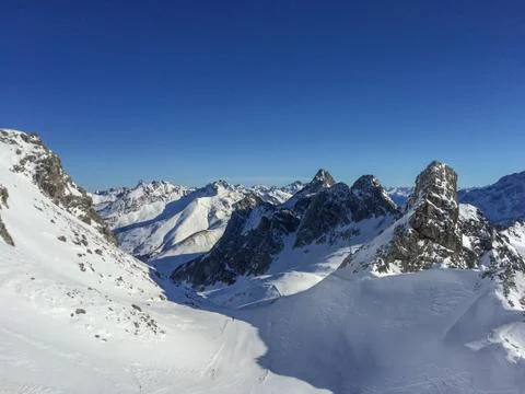 Panoramic view at a ski run at Austrian Ski Resort of St. Anton am Arlberg Stock Photos