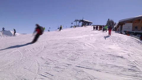 PANORAMIC VIEW WITH SKIERS Stock Footage 121444617