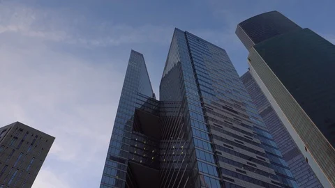 Panoramic view of skyscrapers. Movement of the frame from the bottom up and back Stock Footage 105292755
