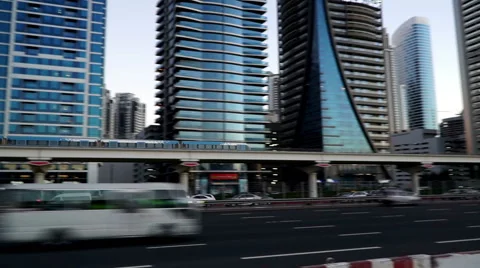 Panoramic view of the skytrain runs to Burj Khalifa and modern buildings Video stock 64219960