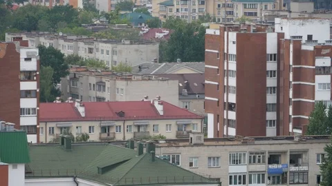 Panoramic view, sleeping area city, playground. Woman and child on the swing 1 Stock-Footage 118811852