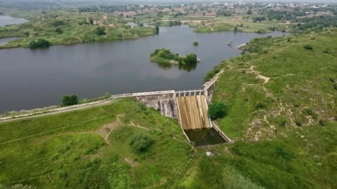 Panoramic view of small dam spillway and village life in dungi pakistan Stock Footage 317367769