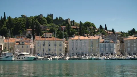 Panoramic view of a small marina. Piran, Slovenia. High definition video. Video stock 79574986