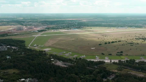 Panoramic view on small private airport near big city. Parked aircrafts inside. Stock Footage 141011901