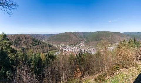 Panoramic View of a Small Village in a Forested Valley Surrounded by Rolling Stock Photos