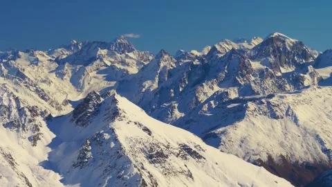 Panoramic View of the Snow Capped Caucasus Mountains in Russia Stock Footage 320853718