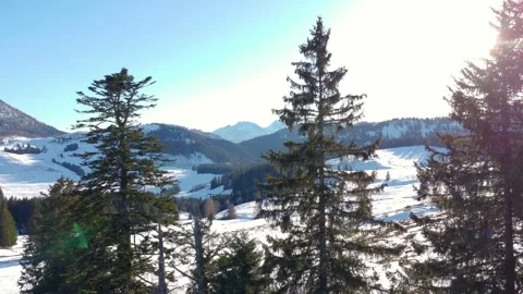 Panoramic view of snow-capped mountains, drone view: natural landscape with a co Stock Footage 303638429