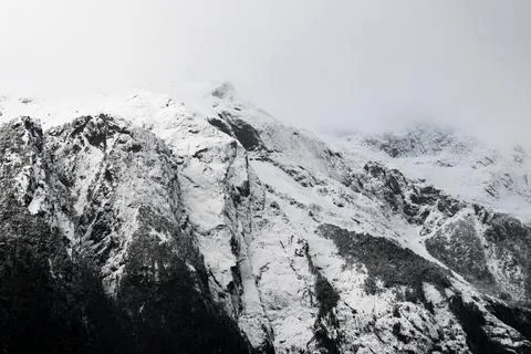 Panoramic view of the snow-capped mountains in hornopiren national park on a  Stock Photos