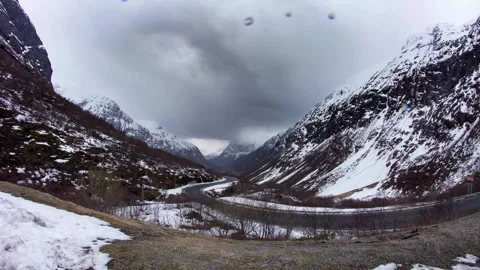 Panoramic View of Snow-Covered Mountain Valley Landscape Stock Footage 310418984
