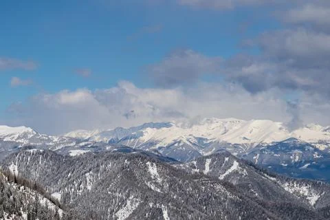 Panoramic view of the snowcapped mountain ranges of High Tauern and Nock Mo.. Stock Photos