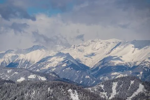 Panoramic view of the snowcapped mountain ranges of High Tauern and Nock Mo.. Stock Photos