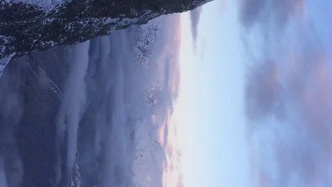 Panoramic view of snowy mountain peaks. Vertical video Stock Footage 123307481