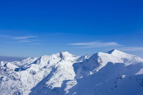 Panoramic view of the snowy mountains Stock Photos
