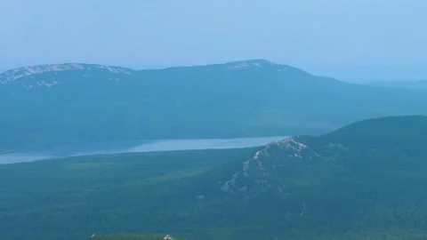 Panoramic View of Southern Ural Mountains and Lake Zyuratkul in Russia during Su Stock Footage 325348408