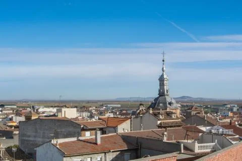 A panoramic view to spanish town Consuegra (Castilla-La Mancha) and a churc.. Stock Photos