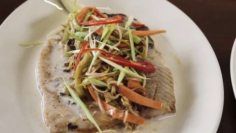 Panoramic view of a spring salad dish on a wooden table Stock Footage 73215708