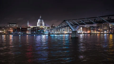 Panoramic view of St Paul's Cathedral and Millennium Bridge at night. London Stock Footage 105166187