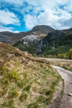 Panoramic view of Steall Waterfall and the mountains in Glen Nevis, Scotland Stock Photos
