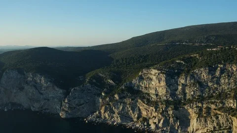 Panoramic view of steep stone coastal cliffs Stock Footage 105388841
