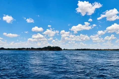 Panoramic view of steppe river with blue water Stock Photos