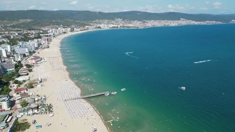 Panoramic view of the Sunny Beach coastline in Bulgaria as a drone hovers above Stock Footage 336552167