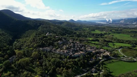 Panoramic view on a sunny day of the town of Mirmande in France Stock Footage 292226232
