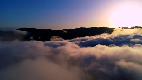 A Panoramic View of the Sunrise and Sea of Clouds Above Bingushi Yu-san Kan Stock Footage 333200764