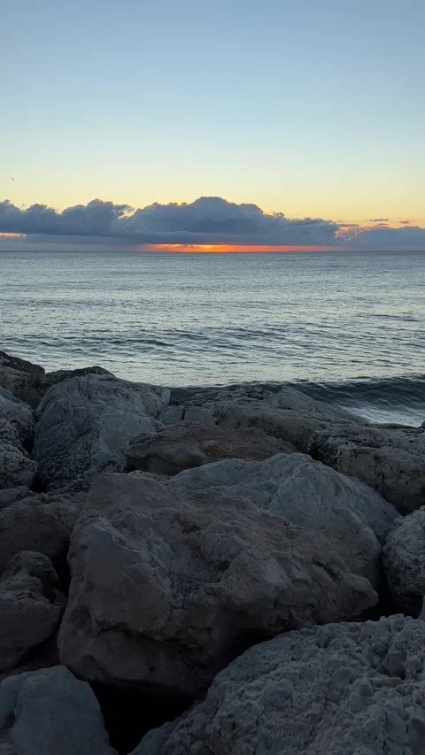 Panoramic view of sunrise over the sea. Vertical video Stock Footage 240921207
