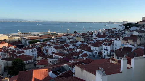 Panoramic view at sunset of the old district of Alfama, Lisbon Stock Footage 250881705