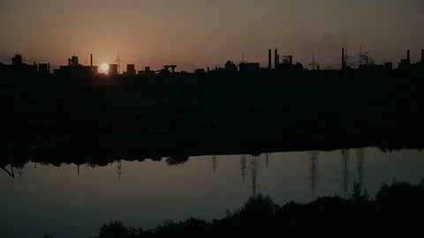 Panoramic View Of Sunset Over Silhouette Factory Stockbeeldmateriaal 88180614