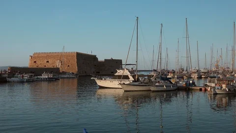 Panoramic view of sunset in Venetian old harbor in Heraklion city, Crete island Stock Footage 117546916