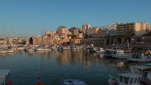 Panoramic view of sunset in Venetian old harbor in Heraklion city, Crete island Stock Footage 117552133