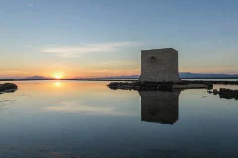 Panoramic View of Tamarit Tower at Sunset in the Salt Flats of Santa Pola Stock Photos